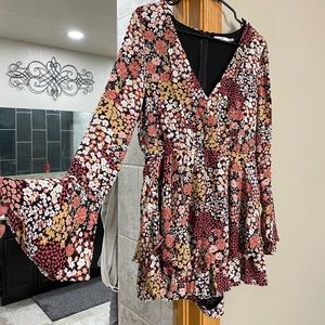 Brand new floral romper. Size large